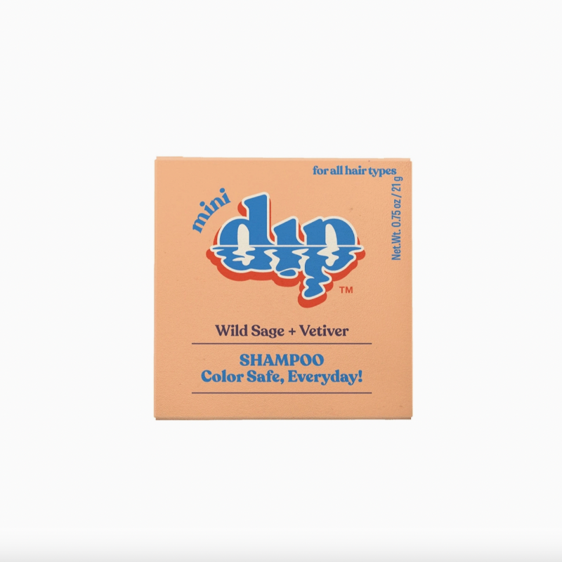 orange box of mini plastic free shampoo bar on white background