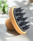 silicone and wood head massager on side 